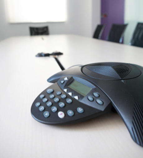telephone a table in a meeting room